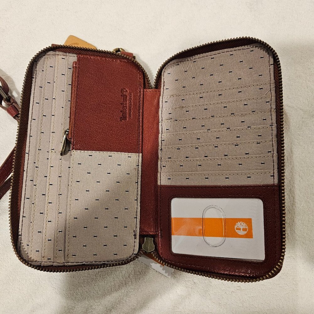 Brand New Timberland cross body RFID pocket book.
